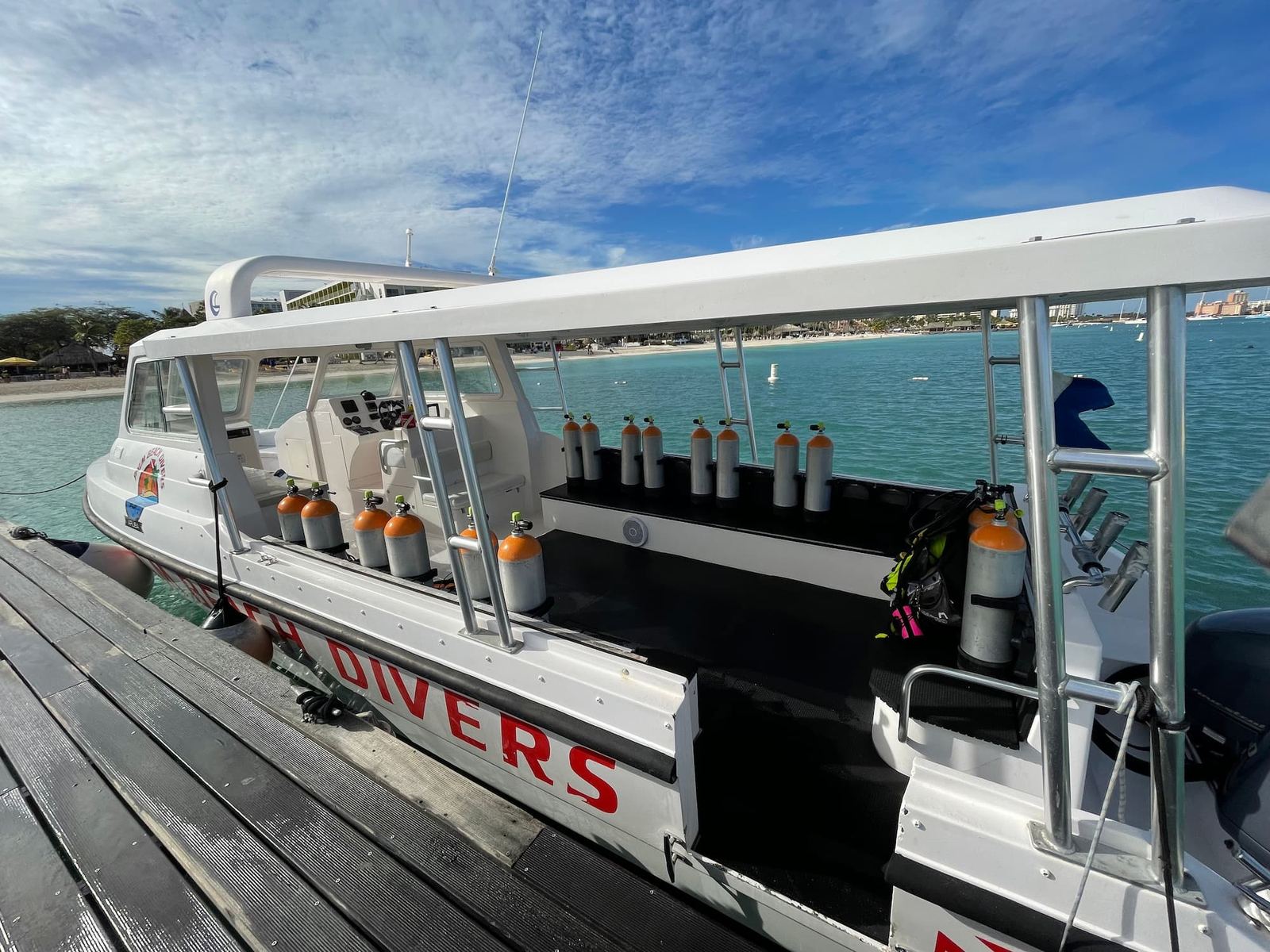 Deck of the boat with tanks lined up, moored at the pier