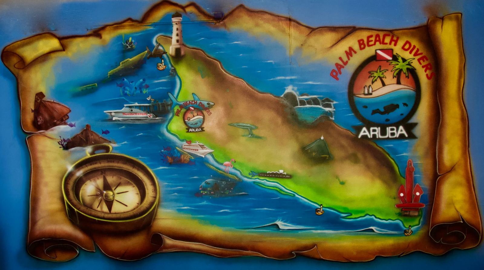 Hand-painted mural of Aruba's dive map at Palm Beach Divers